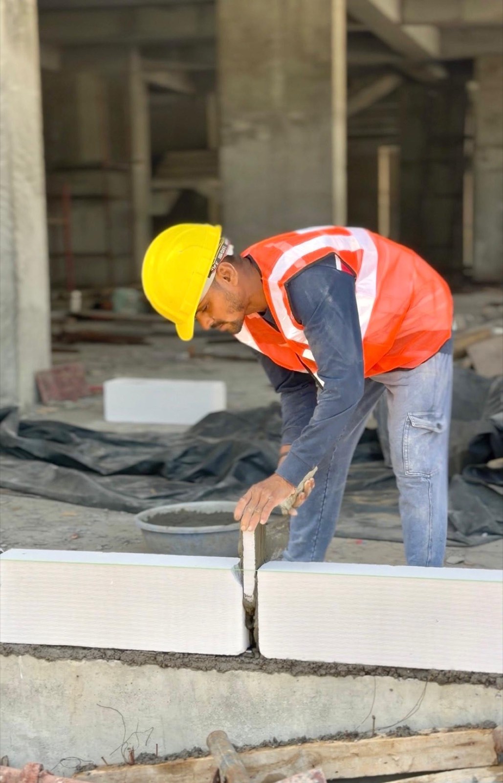 Plaster finishing on an Elimoc Infra site.